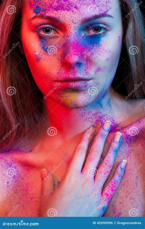 Young Woman Fashion Make Up And Color Powder On Face Stock Photo