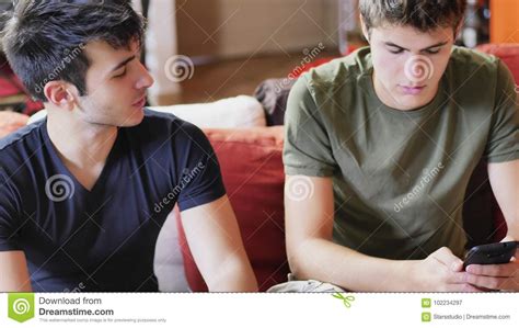 Two Young Men Talking And Chatting Stock Image - Image of recreation ...