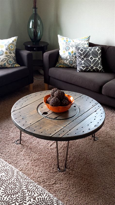 Turning a metallic trash bin into a coffee table is so easy. Coffee Table with Creative Table Legs - Modern Legs