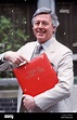 Michael Aspel TV Presenter of this is your life holding red book Stock ...