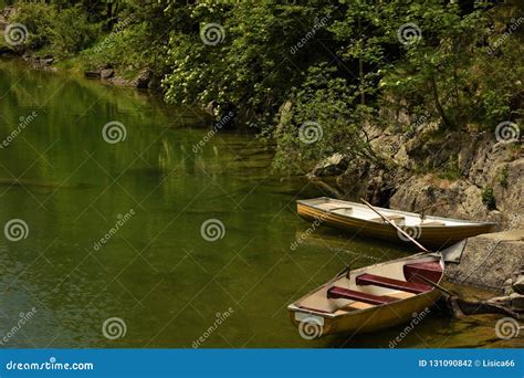 Two Boats On The Shore Of A Mountain Lake Stock Photo Image Of Boats
