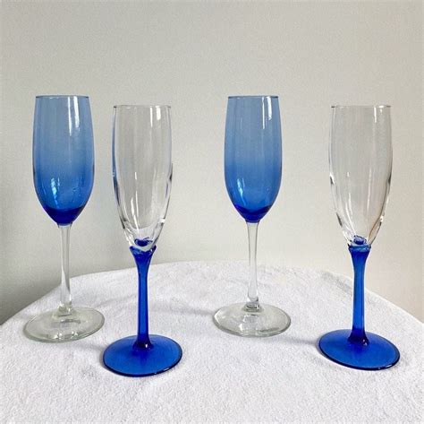 4 Missmatched Champagne Flutes Blue Stem And Glass Champagne Etsy