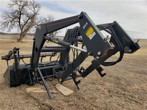 Buhler 695 Quick Attach Loader Wbucket And Grapple Bigiron Auctions