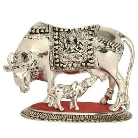 Gifting is a gesture that conveys your love and efforts. White Metal Kamdhenu Cow Calf Statue in Janakpuri, New ...