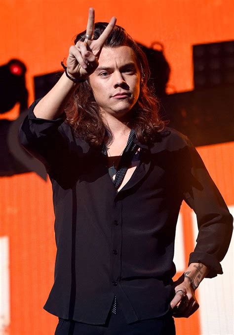 harry styles cuts his famous hair for charity hello