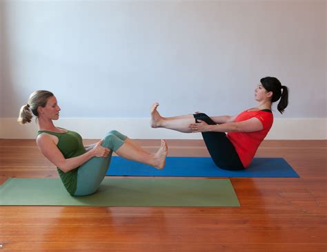 Detailed description of navasana (paripurna navasana) with benefits, yoga sequencing ideas with pictures, contraindications, modifications, variations, and breathing techniques. Navasana-8846 | Yoga Garden San Francisco Bay Area