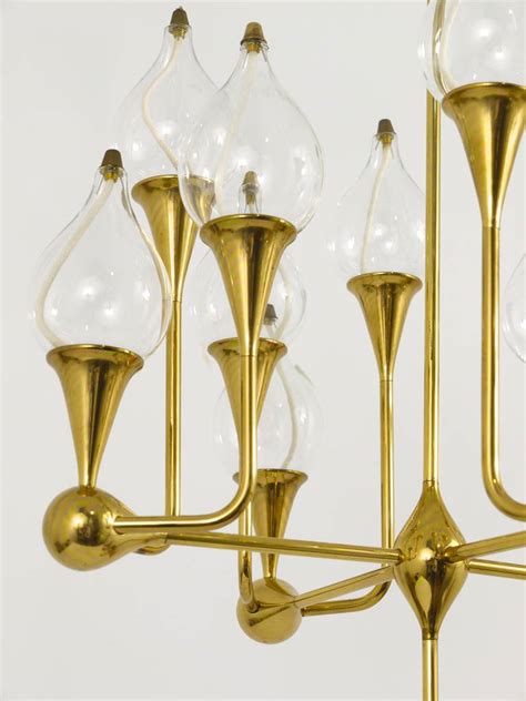 — by lynetta from oroville, ca. Freddie Andersen Danish Oil Lamp Candle Brass Chandelier, 1970s at 1stdibs