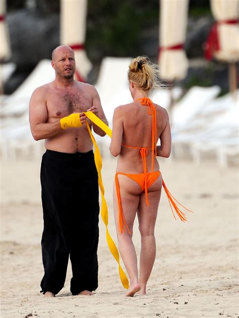 Nicolette Sheridan In Bikini Working Out On The Beach In St Barts Hawtcelebs