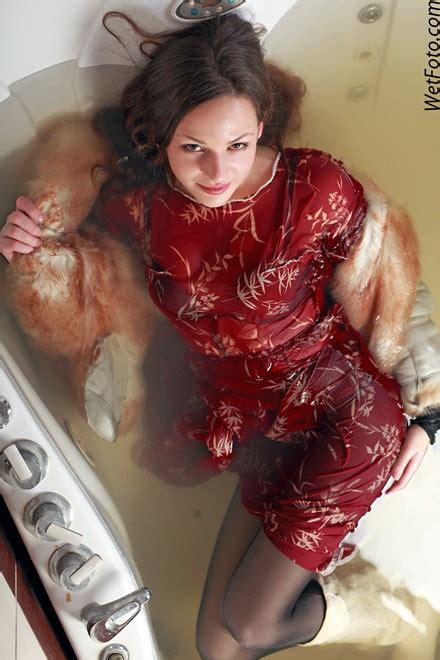 Wetlook By Girl In Fur Coat Dress Tights And Leather Boots In Jacuzzi