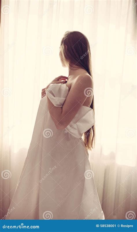 Beautiful Lady With Long Hair Wrapped In Bedsheet Stock Image Image