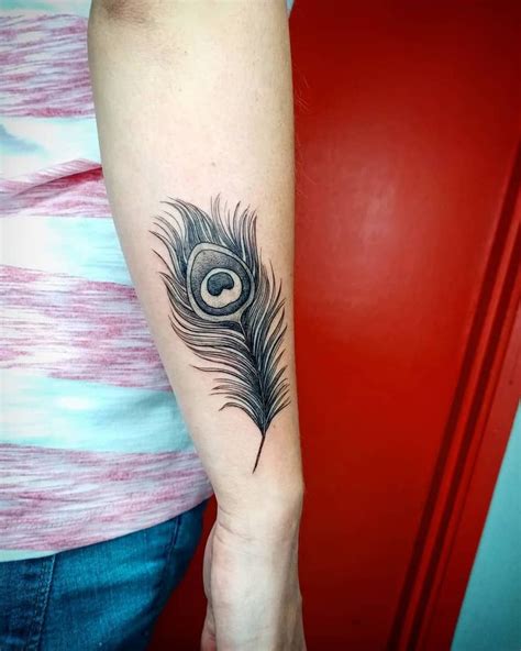 109 Best Peacock Feather Tattoos [2024 Inspiration Guide] Feather Tattoo Black Feather Tattoo