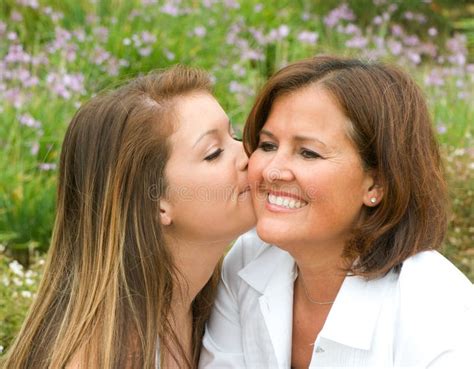 Daughter Kissing Mother Stock Image Image Of Woman Cheerful