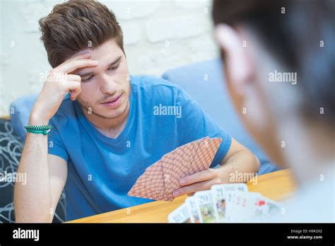 Friends Playing Card Indoors Stock Photo Alamy