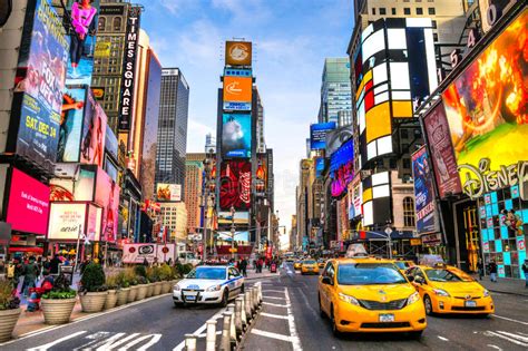 The area around times square called the theatre district. NEW YORK CITY -MARCH 25: Times Square, Featured With ...