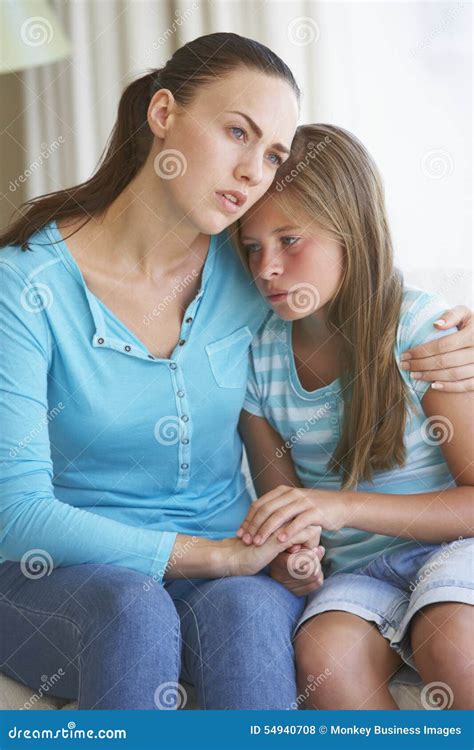 Mother Comforting Daughter At Home Stock Photo Image Of Together