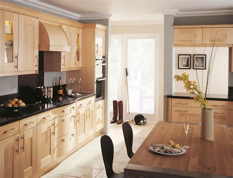 The first example is the south shore fiesta 62. Maple kitchen with dark countertops | Maple kitchen, Top ...