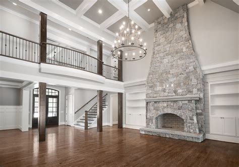 Please ignore all the kid toys! Such a beautiful great room with the floor to ceiling ...