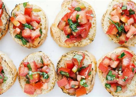 Toasted Baguette Slices Topped With A Fresh Tomato And Basil Mixture