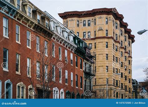 Row Houses And A Historic Highrise Building In Mount Vernon Baltimore