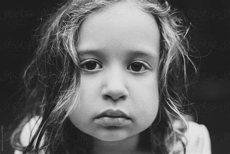 Close Up Portrait Of A Beautiful Young Girl In Black And White By