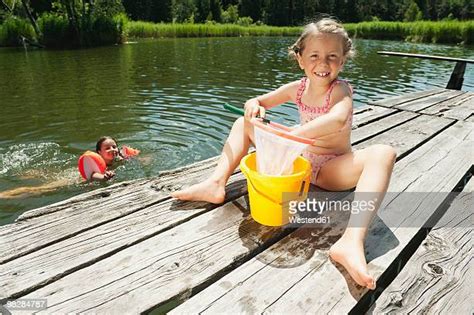 Young Girl Swimsuit Background Photos And Premium High Res Pictures Getty Images