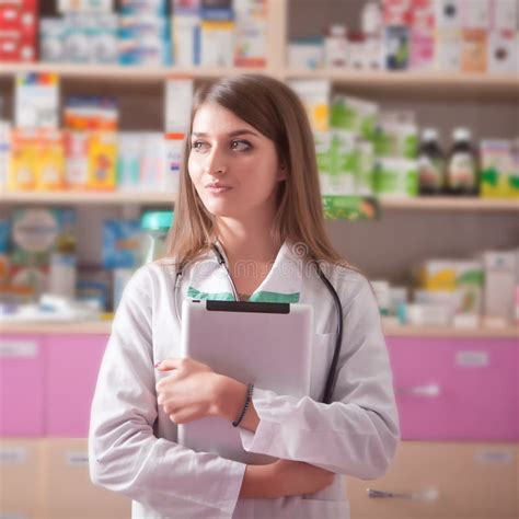 Pharmacist Girl With Digital Tablet In Hand In Pharmacy Stock Image Image Of Drugs Beautiful