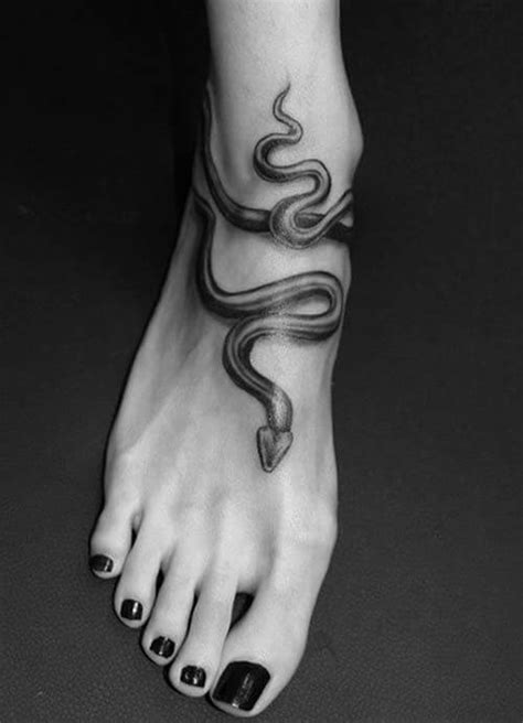 If you have tall and thin legs and want to show off with a get this tattoo design. Scary Snake Tattoose On The Leg / Snakehead tattoos have a lot of energy and movement. - Vonny Wall