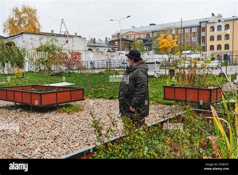 In the historic city of Riga, a bearded elderly man passionately