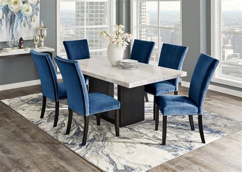 White table and blue wooden chair. Cosmopolitan 7 Pc. Dinette w/White Marble & Blue Chairs - The RoomPlace in 2020 | Marble tables ...
