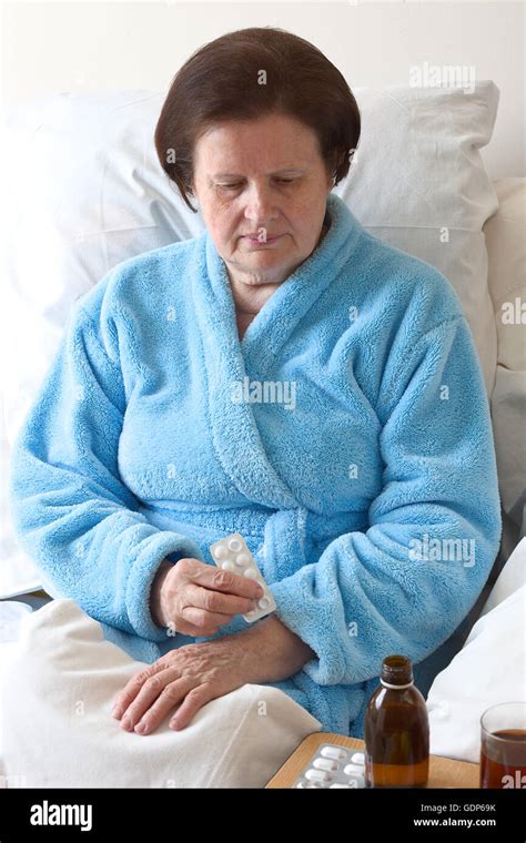 Sick Woman In Bed Stock Photo Alamy