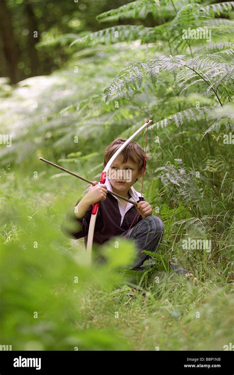 Boy In The Woods Stock Photo Alamy