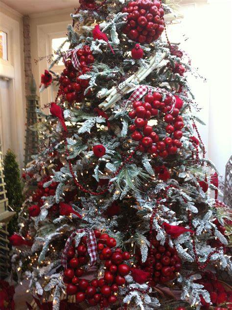 Beautiful Red Bird Flanked Christmas Tree Courtesy Of Seasons In