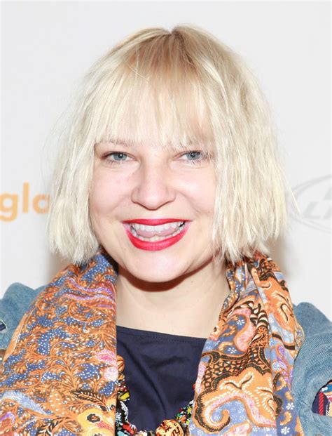 Why Does Sia Cover Her Face With A Wig Heres The Answer Allure Sia