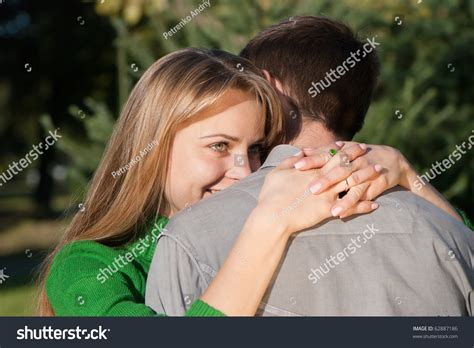 Beautiful Mature Woman Hugging Her Husband With Love Stock Photo