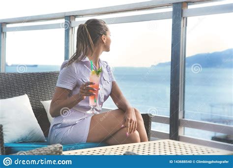 Woman Sits In The Beach Bar With Coctail Stock Photo Image Of