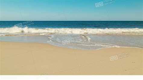 Waves Washing Ashore A Beautiful Sandy Beach Stock Video Footage 11311756
