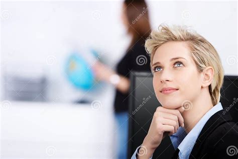Thoughtful Businesswoman Looking Up In Office Stock Photo Image Of