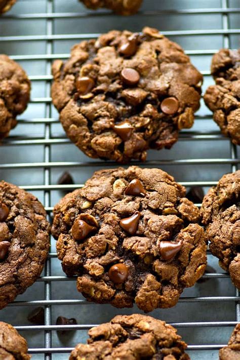 Add 4 tablespoons sweetener, ½ cup butter, ½ teaspoon salt, ¼ teaspoon allspice, ½ teaspoon cinnamon, ⅛ teaspoon nutmeg, 2½ cups oatmeal, ½ cup chopped nuts, and 1 teaspoon soda. Soft and Chewy Double Chocolate Oatmeal Cookies