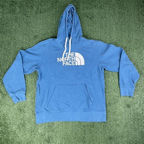 Blue The North Face Hoodie Size L Depop