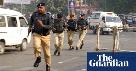 Pakistan Hit By Attacks On Police Buildings World News The Guardian