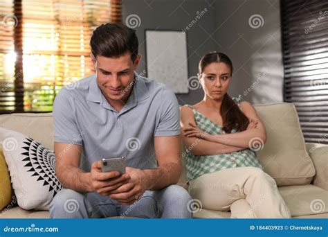 Man Preferring Smartphone Over Spending Time With His Girlfriend Jealousy In Relationship Stock