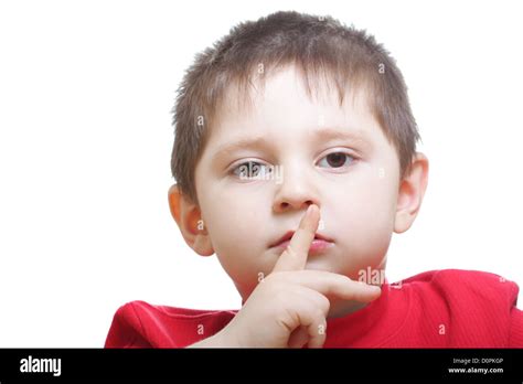 Boy In Red Showing Hush Gesture Stock Photo Alamy
