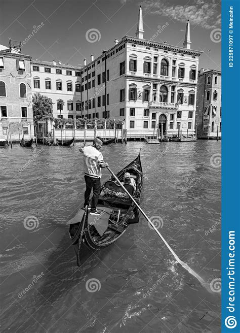 People Enjoy The Gondola Ride At Canale Grande In Classical Hand Driven Gondola Venice