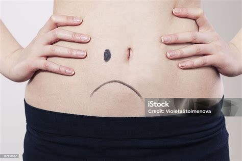 Womans Belly Stock Photo Download Image Now Belly Button Sadness