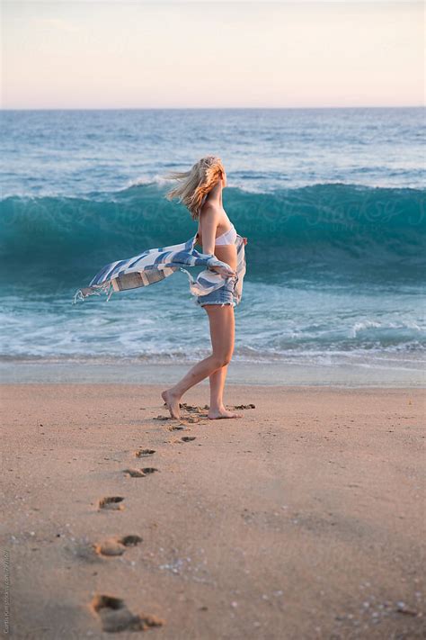 Beautiful Blonde Girl Dancing On The Beach By Stocksy Contributor Curtis Kim Stocksy