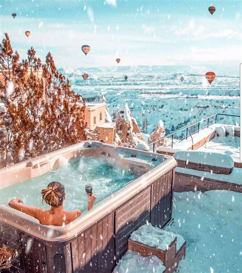 An Instagram Page With A Hot Tub In The Snow