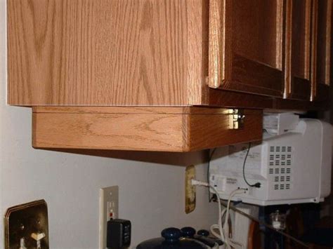 Salt™ cabinet storage rack in white. Creative Kitchen Storage Idea-Under Cabinet Spice Rack