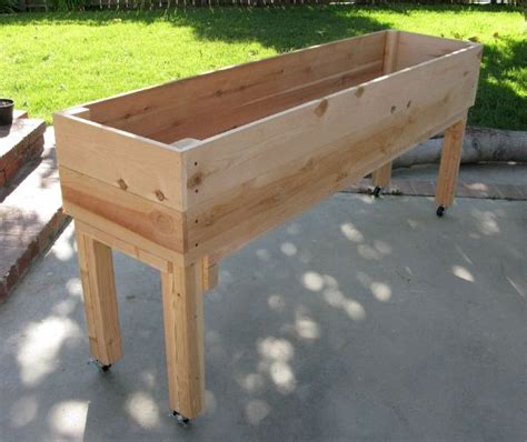 The raised garden bed is a boxy unit that allows you to plant flowers, herbs, and vegetables just about anywhere outdoors. YES. this would be PERFECT for my sun/shaded yard. | Raised planter boxes plans, Raised planter ...