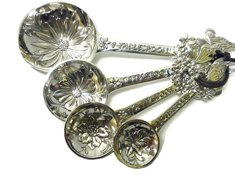 There are plastic, metal and even ceramic sets to choose from so it's not a problem to find an ideal the measuring cups are one of the most useful utensils in the kitchen. Ganz BUTTERFLY metal MEASURING SPOONS kitchen GIFT | eBay