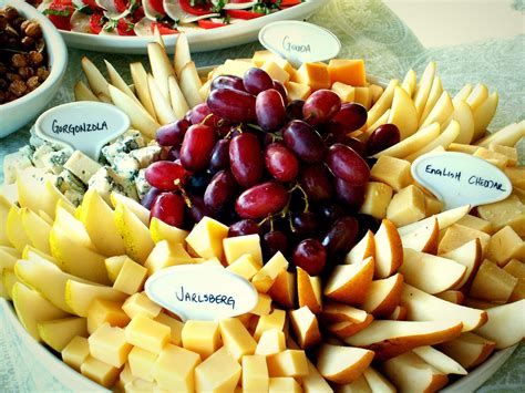 Cheese And Fruit Tray Featuring Crumbly Gorgonzola Creamy Gouda Aged